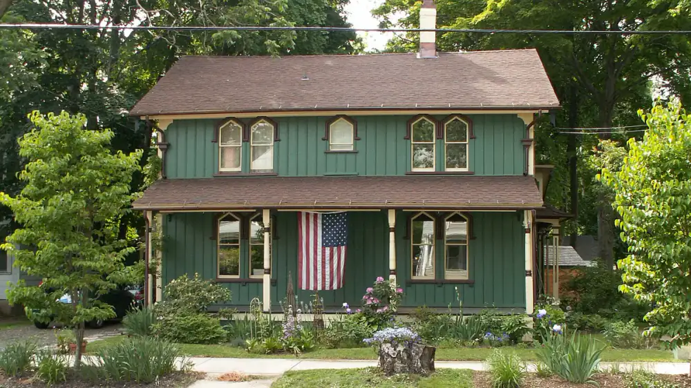 Vertical board-and-batten siding on a home exterior with evenly spaced battens