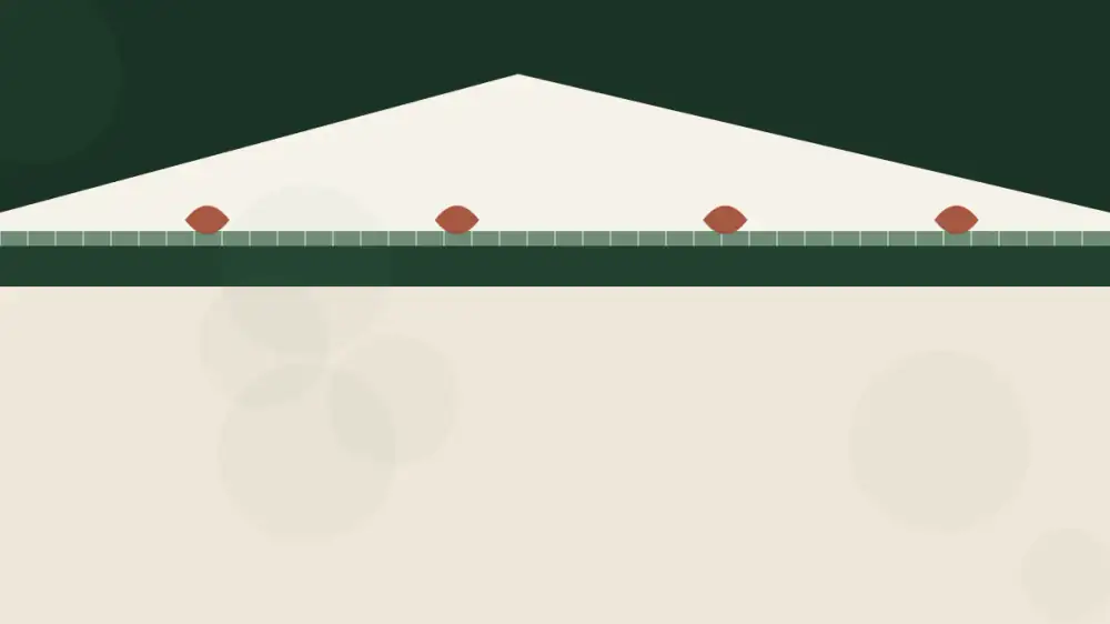 A bristle brush gutter guard insert sitting in a gutter trough