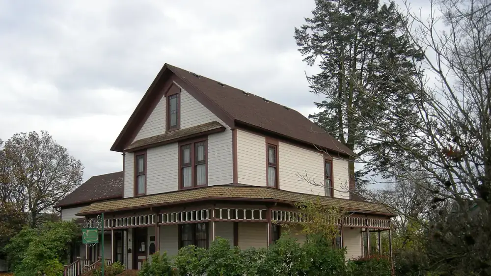 A house shown against varied weather representing different regional climates