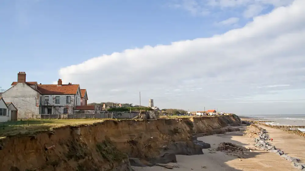 A coastal home exterior exposed to sea air and wind-driven rain