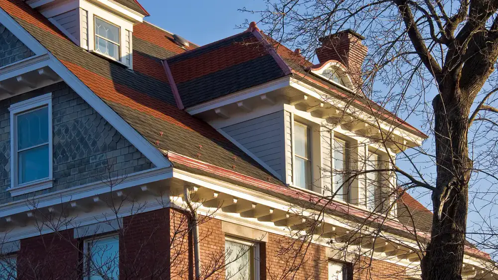 A loose gutter hanger pulling away from the fascia board