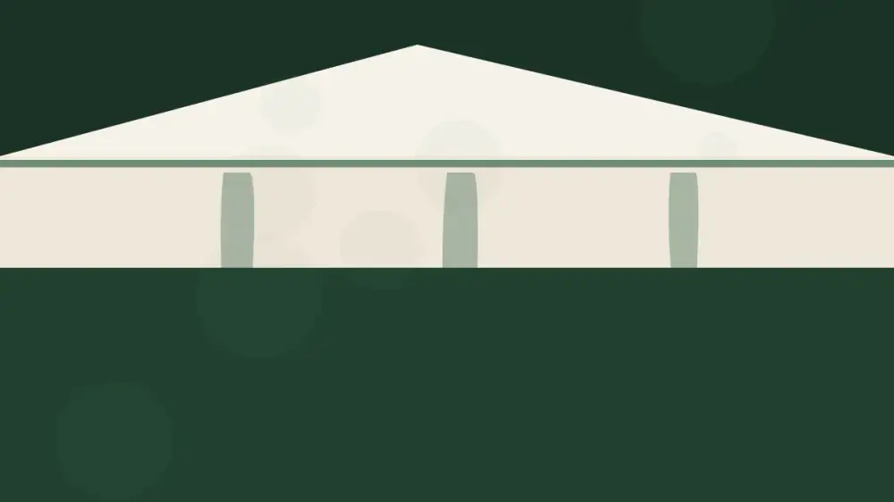 Brown water stains streaking down the fascia and soffit below a roof edge