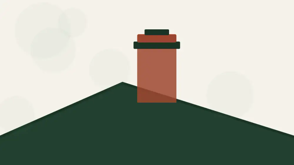 A brown water stain on a ceiling next to an interior chimney wall