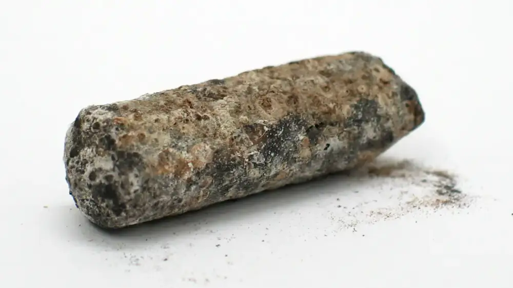 Corrosion staining where a copper component meets an aluminium surface outdoors